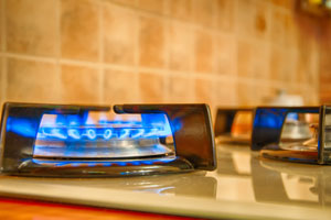 How can I tell if I have a gas leak, and what should I do if I detect one?